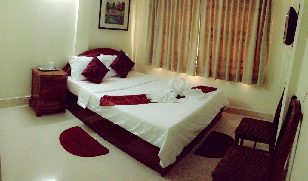 Homeland Guesthouse Phnom Penh Habitación foto