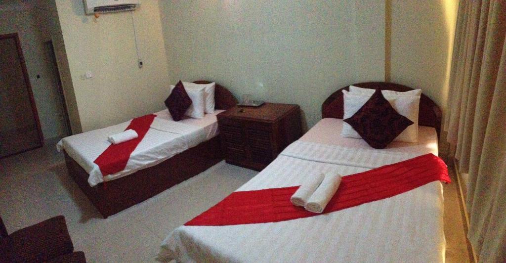 Homeland Guesthouse Phnom Penh Habitación foto